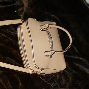 An Alyssa Handbag with the most Pockets you'll ever see on a purse!